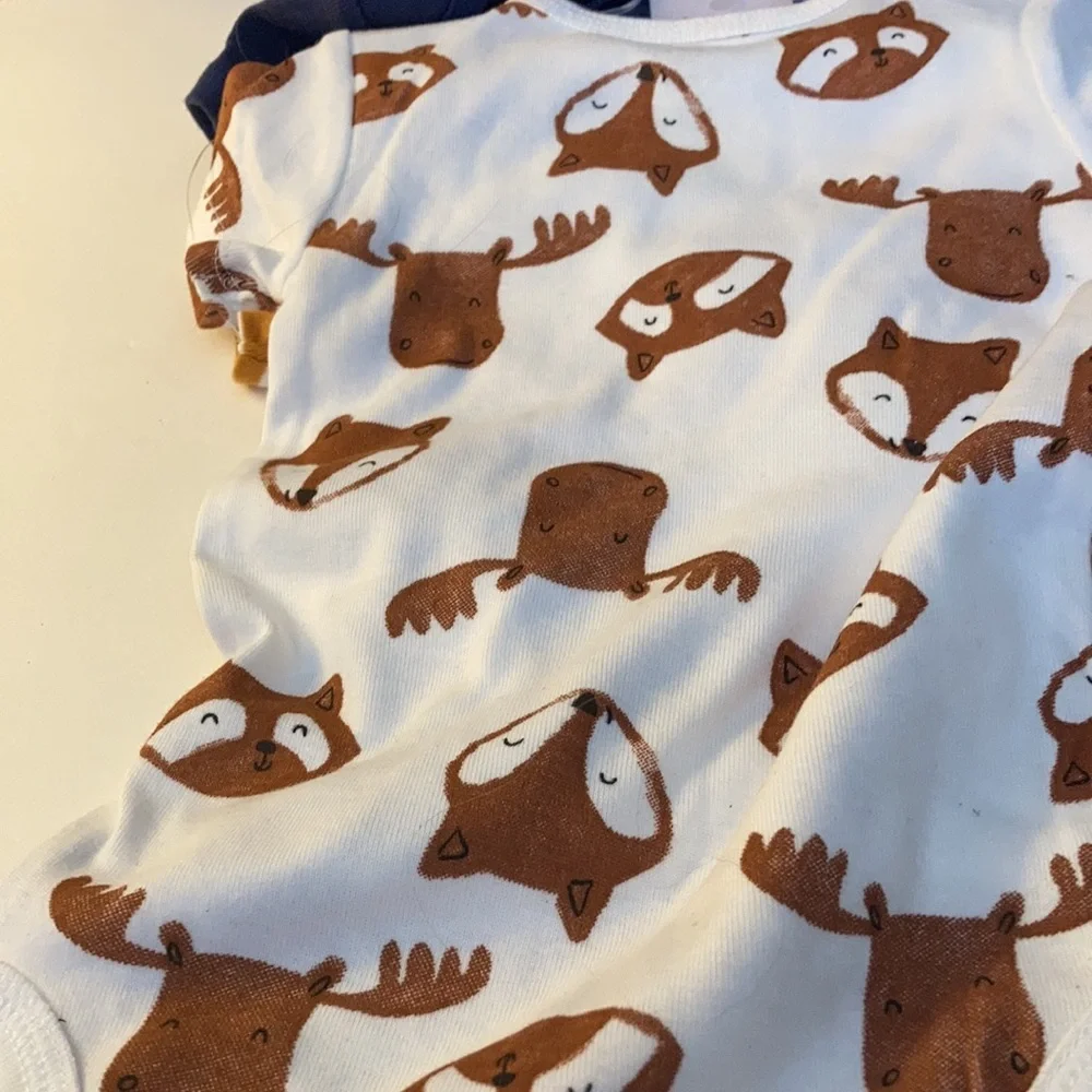 FINAL MARKDOWN NWT three pack carter’s just one you one pieces (9 months)